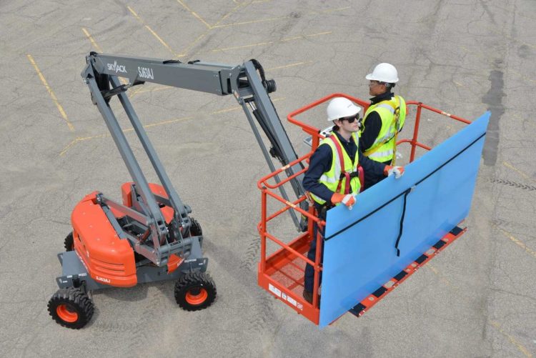 Cherry picker rental truck on an active construction jobsite in Pittsburgh PA